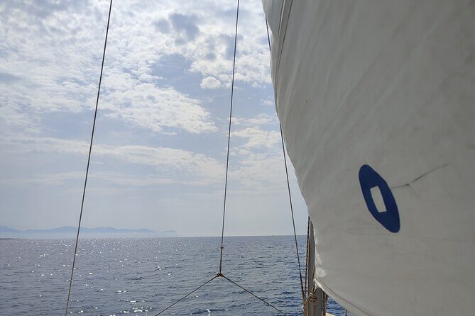4 Hours Catamaran Tour to the Scala dei Turchi - Capo Rossello Lighthouse And The Madonnina Statue: What You See From The Water
