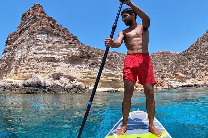 7 hours Boat trip to Lampedusa lunch, SUP and Snorkeling - The Lampedusa Monument Stop: A Quick Human Moment on a Sea Day