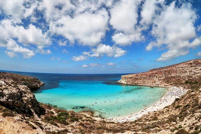 7 hours Boat trip to Lampedusa lunch, SUP and Snorkeling - La Tabaccara Inlet: 50 Minutes of Crystal-Water Time