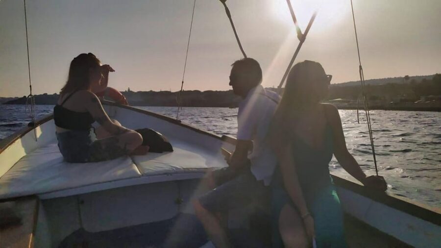 Aci Trezza boat tour sunset and dinner sicilian family home - Cyclops Coast at sunset: why this timing matters