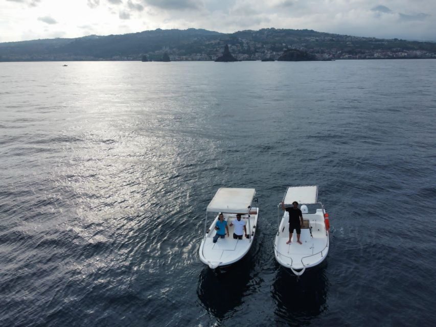 boat tour exploring and searching for dolphins in Acitrezza - Stop 1: Lachea Island and the Cyclops archipelago’s protected edge
