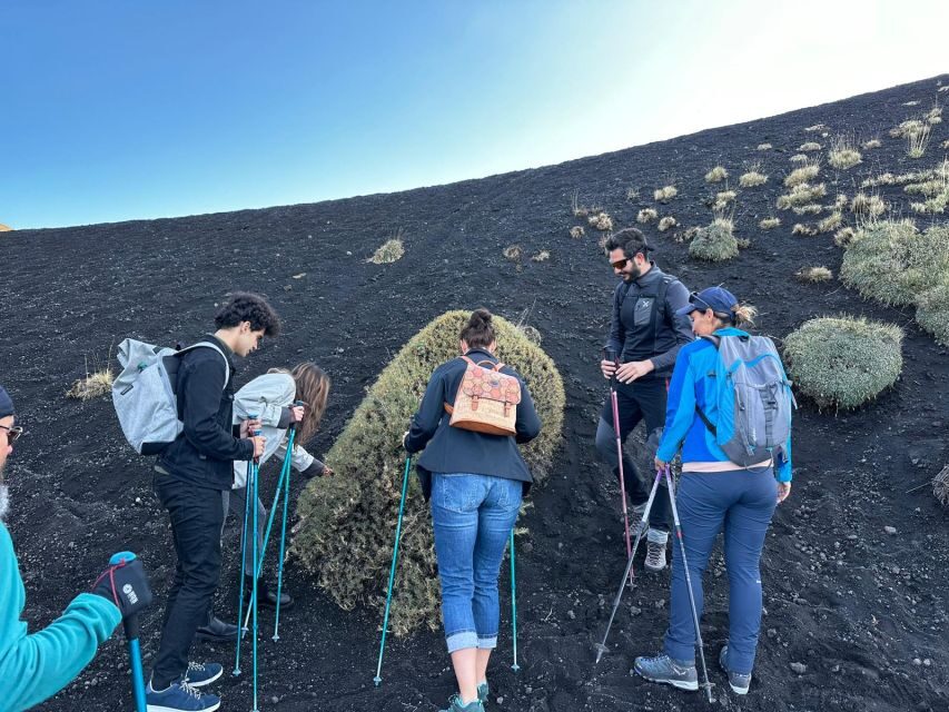 Catania: Etna Morning or Sunset Trek with Lava Tunnel & Gear - Entering the lava tube: helmet on, flashlight ready