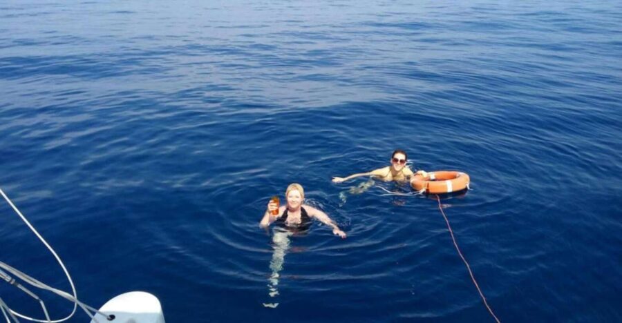 Catania: Sailing Tour with Lunch - Baia dei Ciclopi and Acitrezza’s Faraglioni from the sea