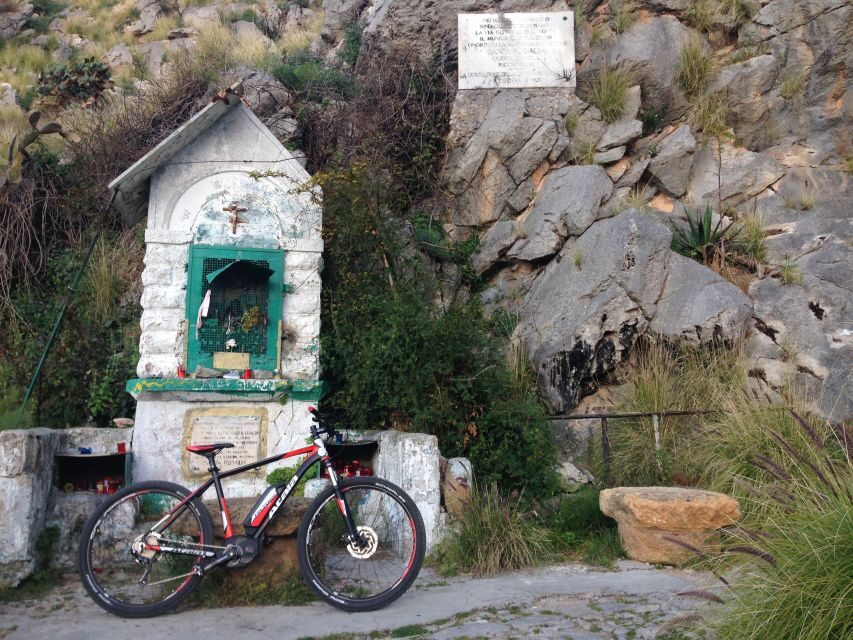 Discover MtPellegrino with a PRIVATE Guided Bike Tour - Santa Rosalia sanctuary and the Holy Grotto cave story