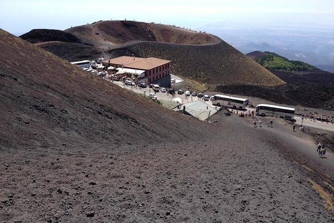 Etna Morning Experience: Cave, Trails & Tasting from Syracuse - Grotta dei Tre Livelli lava-tube caving with helmets and flashlights