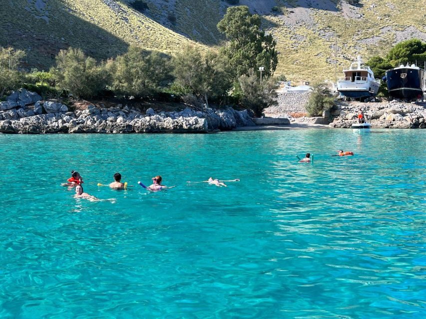 Full day boat tour in Palermo with Palermo in Boat - Mondello Beach: aperitivo on the coast and classic Sicilian bites