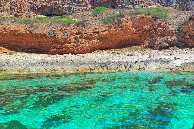 Full Day Sailing Boat Tour to the Egadi Islands - Levanzo’s full roster: towns, coves, and the stack