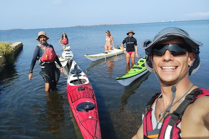Guided kayak tour inside the Stagnone of Marsala - What You See: White Salt Pans, Windmills, and Famous Light