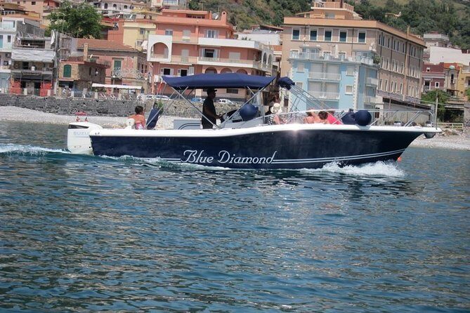 Half day with lunch in luxury private tour - A private boat route that turns Taormina into a shoreline story