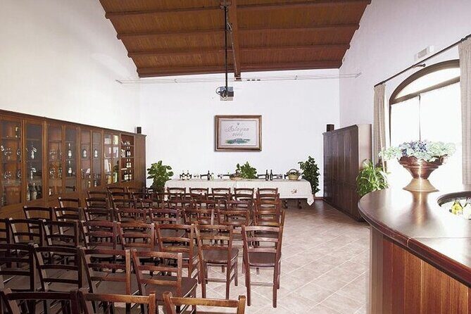 Historic winery visit with food and wine tasting in Marsala - Inside the tasting area: local bites meet 12 different wines