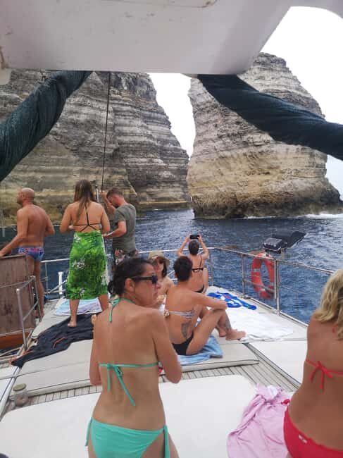 Lampedusa: Yacht excursion, swimming stops and typical lunch - What to bring: snorkeling setup that isn’t included