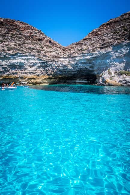 Lampedusa: Yacht excursion, swimming stops and typical lunch - Caves close-up: entering them safely and realistically