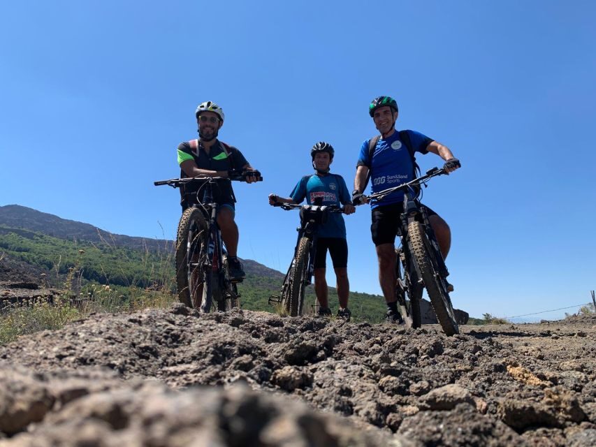 Mount Etna: Summit Cycling Tour - The ride up: northern Etna dirt paths, ancient craters, and lava flow drama