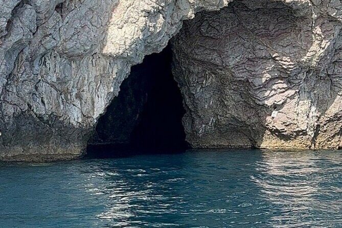 Private boat tour Giardini Naxos Taormina with platter and wine - The Sand-Strip Island: Heritage, Stillness, and a Scene You Can Find