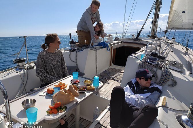 Sailing tour at sunset in catania - Second Ognina stop: lava flows and Etna views from the water
