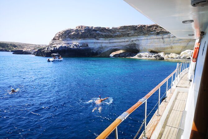 SciatumiaDay boat tour to Lampedusa with typical lunch - Lampedusa cove time: lunch on the water plus another swim