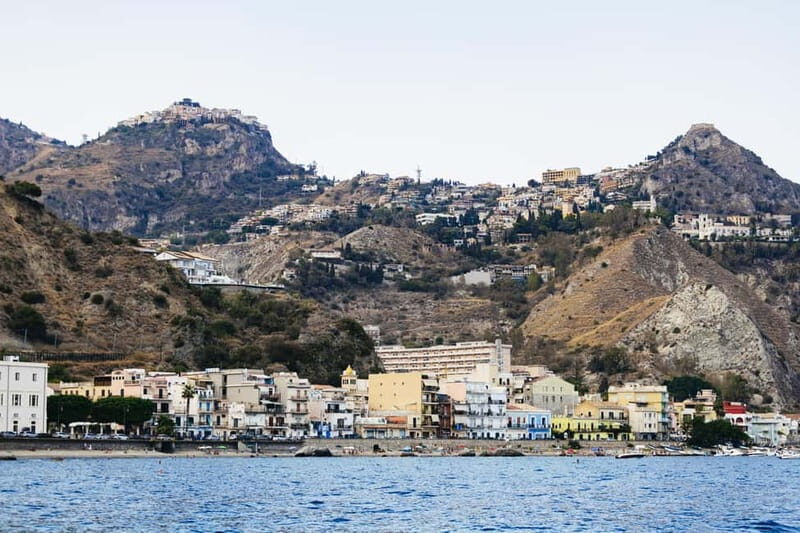 Taormina: Sunset Boat Tour with Dolphin Watching & Aperitif - Grottos and sea caves: Grotta del Giorno, Grotta delle Sirene, and more