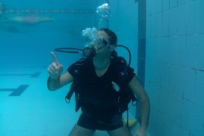Try Scuba Dive (baptism of the sea) - Corrado’s instruction style: calm, detailed, and confidence-building